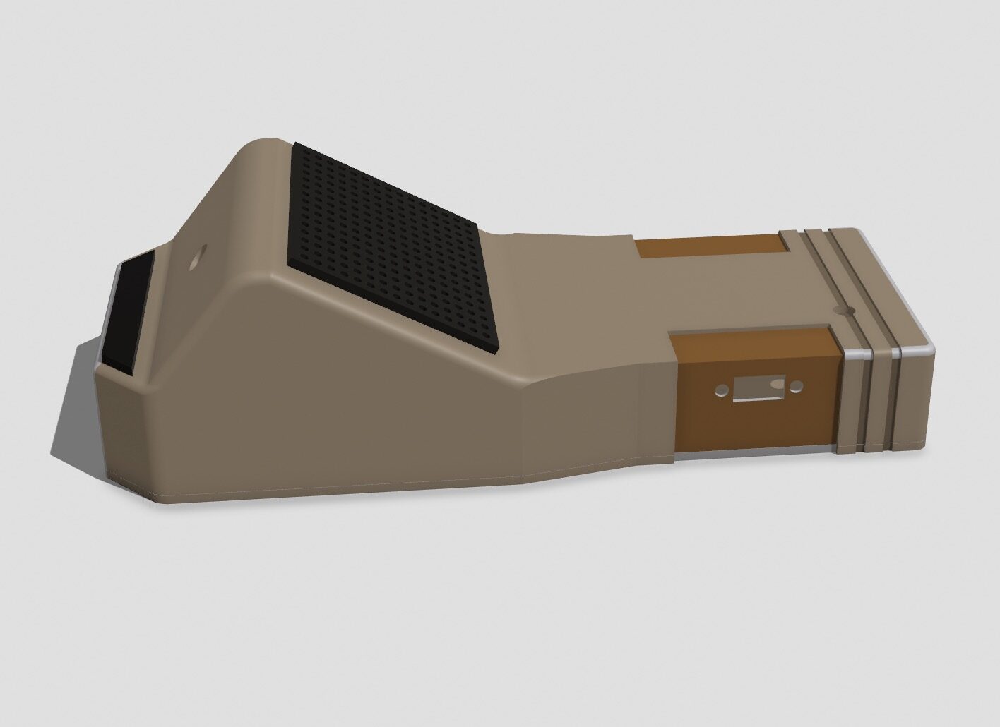 CAD render of the tan handheld case with a black speaker grille