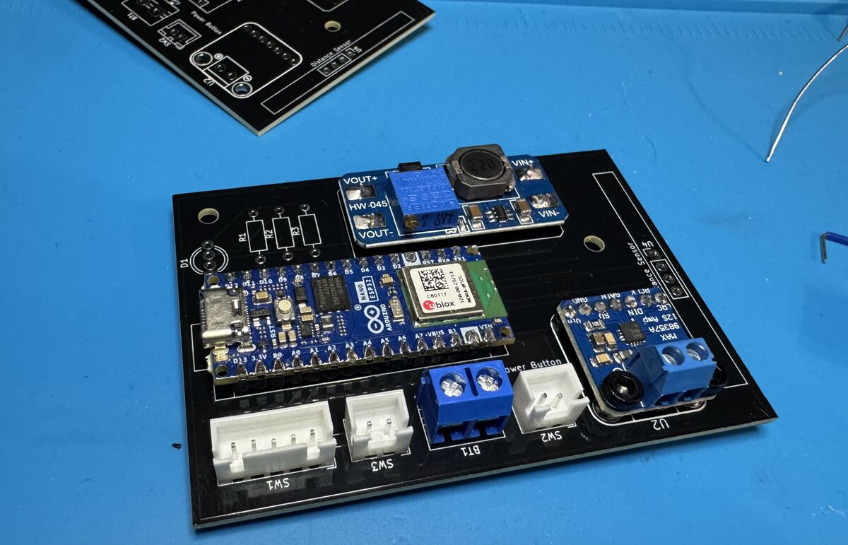 The soldered board with the Nano, boost converter, amp and connectors