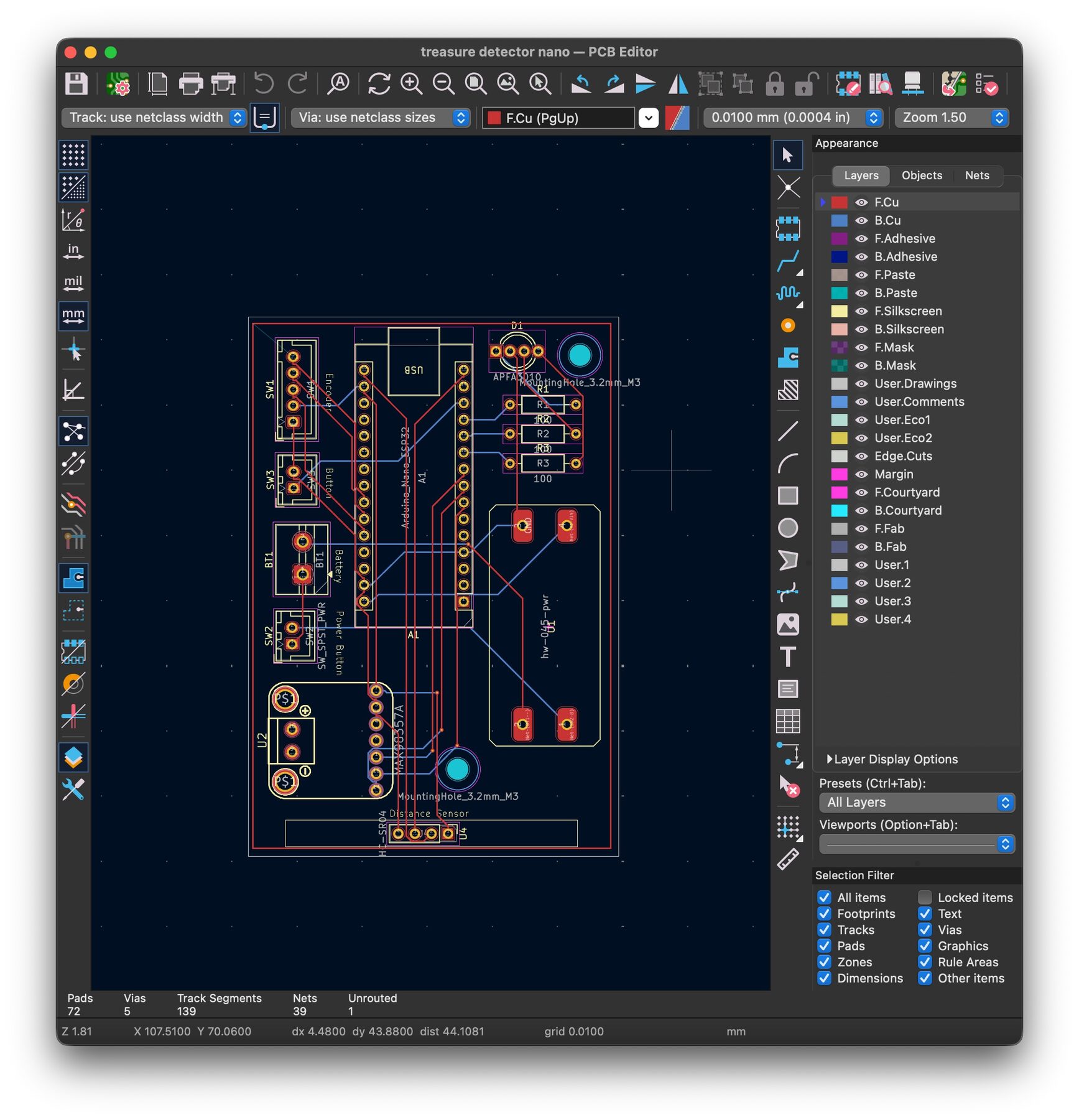 The PCB layout in KiCad's PCB editor, with red front-copper and blue back-copper traces