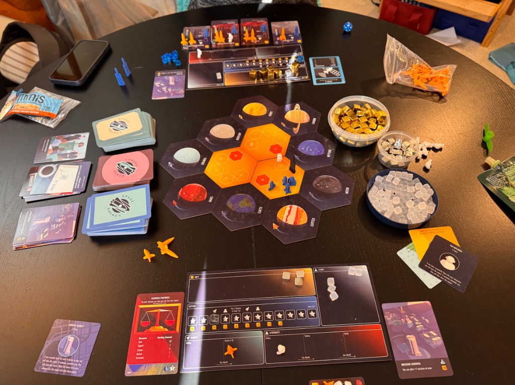 Full game setup with hexagonal planet tiles and components