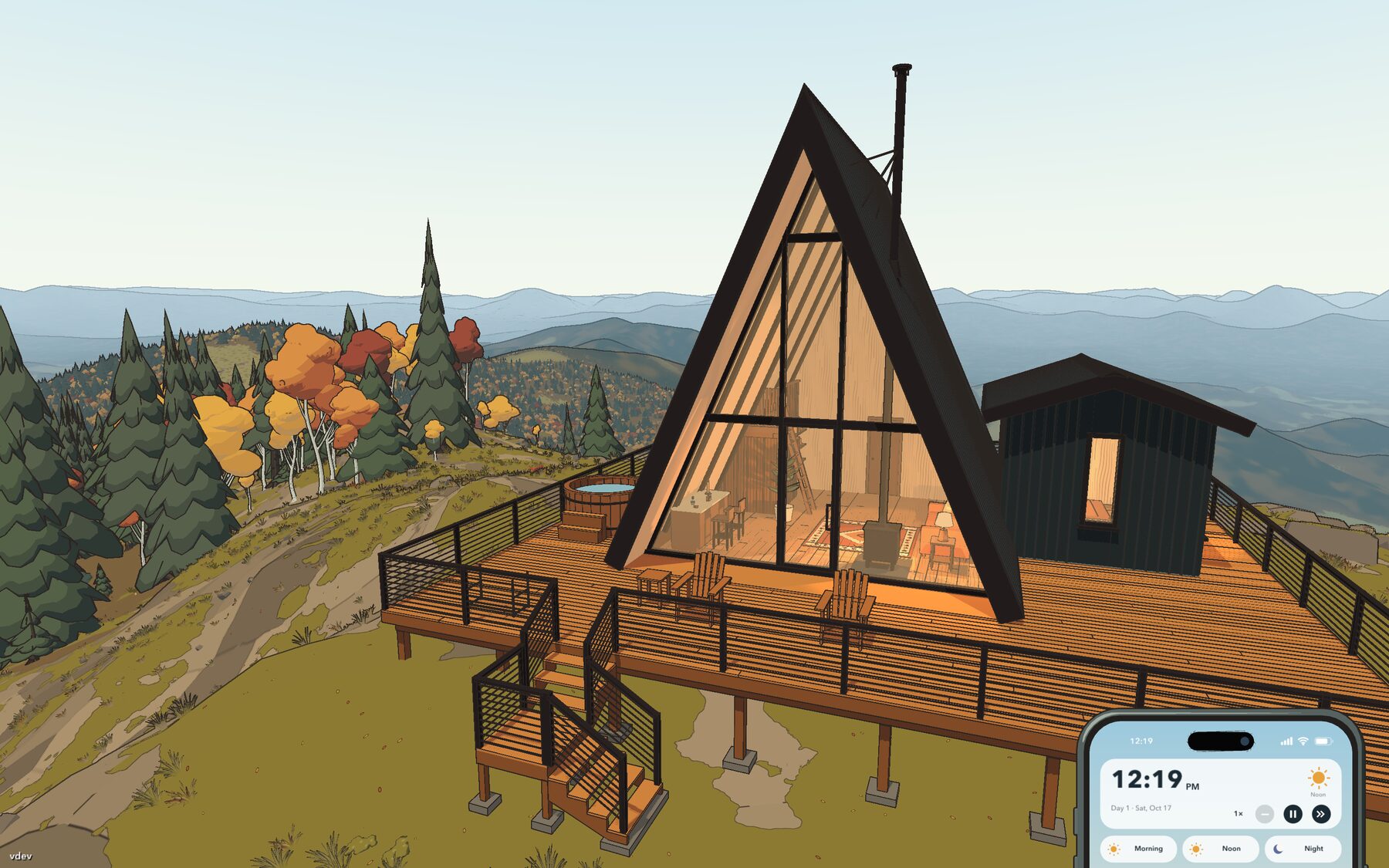 The black A-frame and its deck on the summit, autumn trees and blue ridges behind it