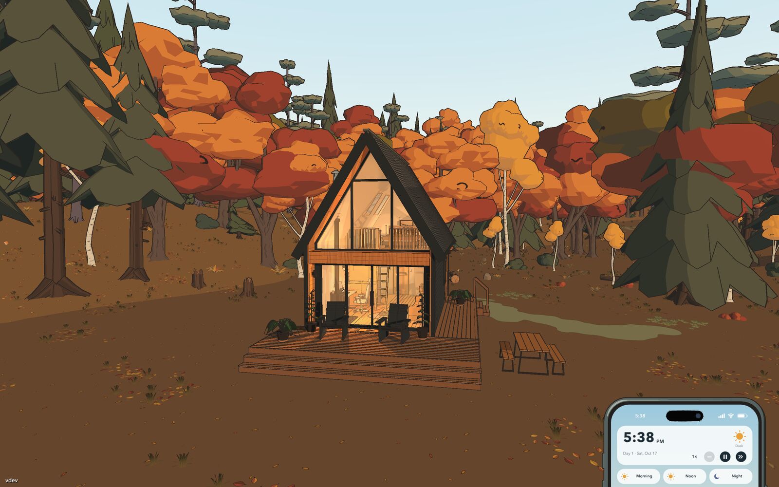 A small black cabin with a glass gable among orange and red autumn trees